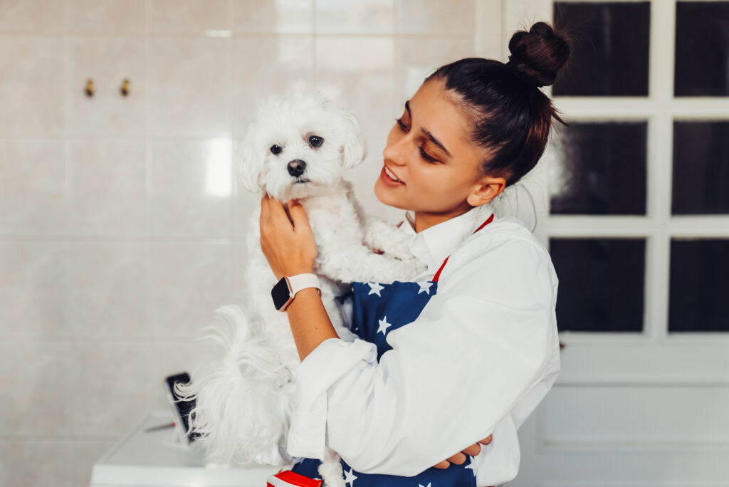 Image of a beautiful girl and happy dog